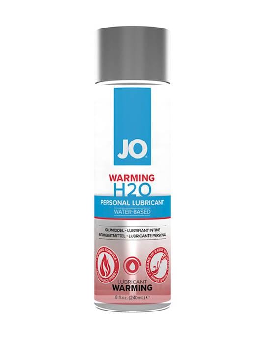 A bottle pictured on a stark white background that makes the bottle look empty of contents. The bottle has a shiny grey round lid on the top and the label is blue and red.