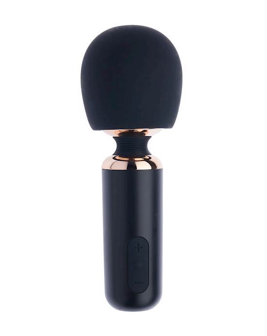 A round, curved soft rubber looking head which is attached to the bottom piece with some gold shiny metal and both the head and bottom are black.