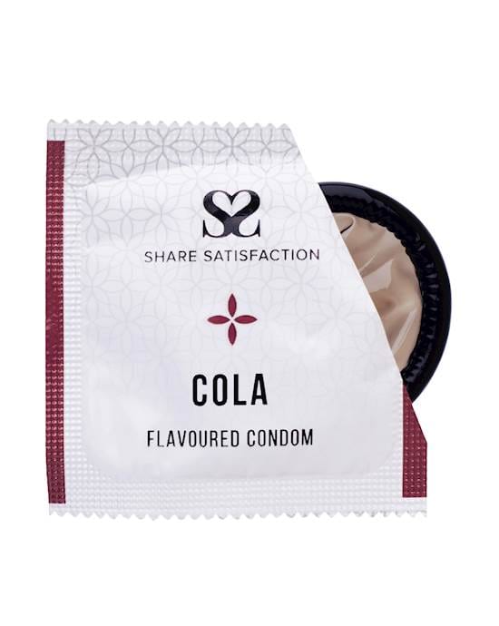 A white square packet with two edges bevelled and a corner torn to reveal a round rubber brown object inside.